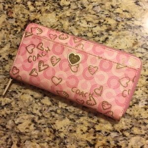 Just lowered $35 firm Poppy Coach pink wallet